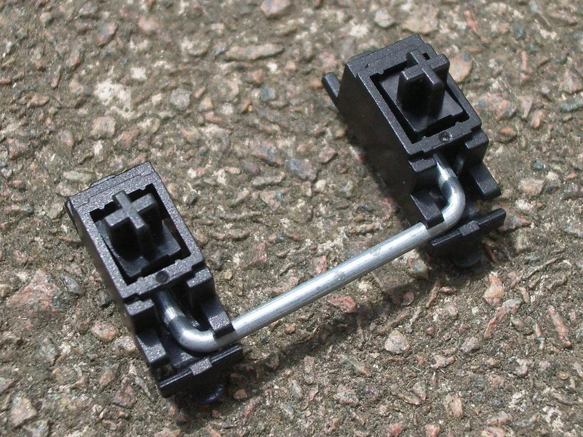 PCB-mount stabilizer wire and housings ready for installation