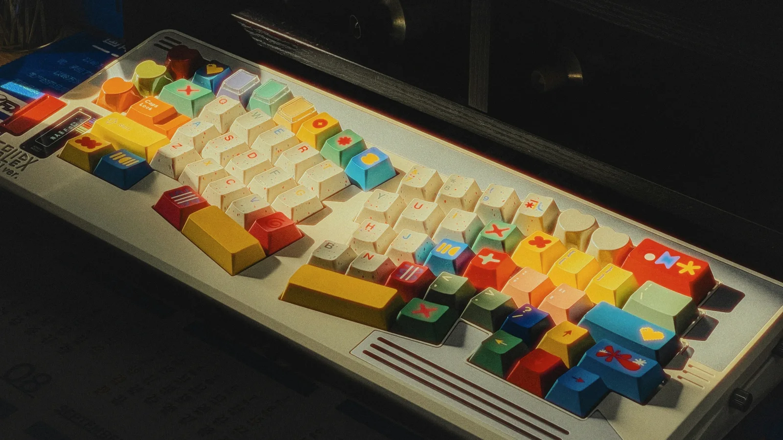 Mechanical keyboard fitted with colorful custom keycaps in varied shapes