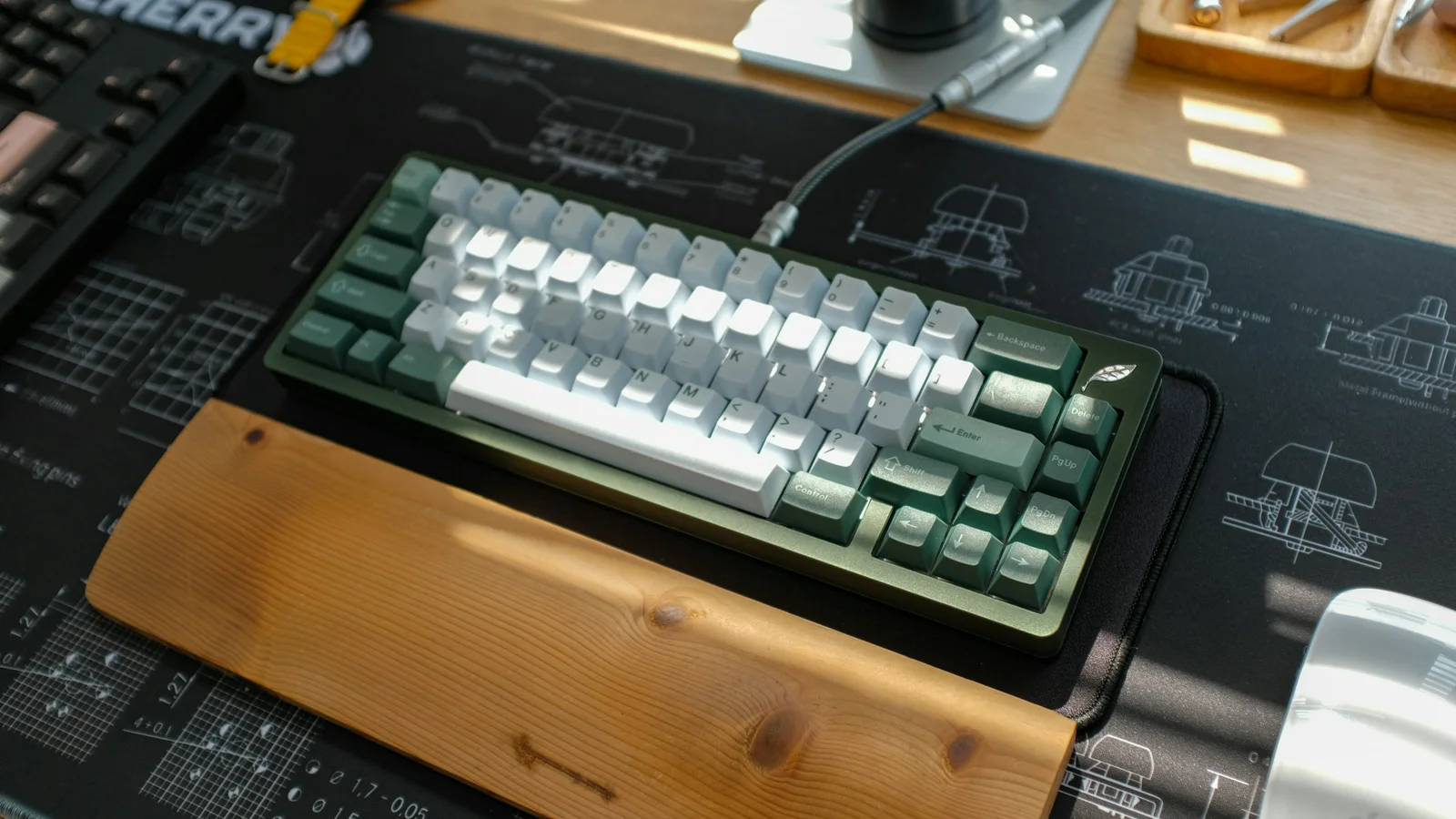 Mechanical keyboard resting on a desk mat in a quiet workspace